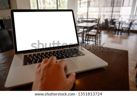 Mockup image of business Laptop with blank screen on table blank copy space screen for your advertising text message