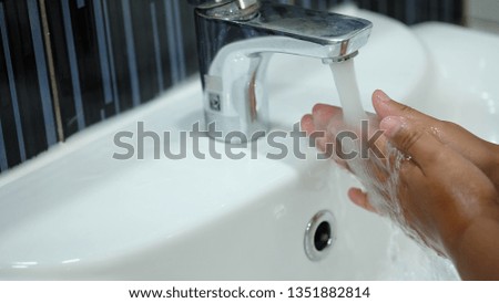 child hand washing
