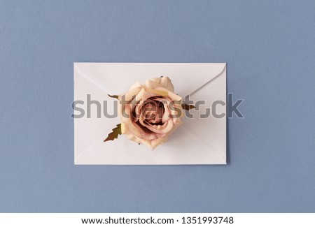 pastel space and envelope with rose flower and pencil