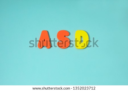 ASD. Autism spectrum disorder from color letters on blue background , World Autism Awareness Day, April Autism awareness month