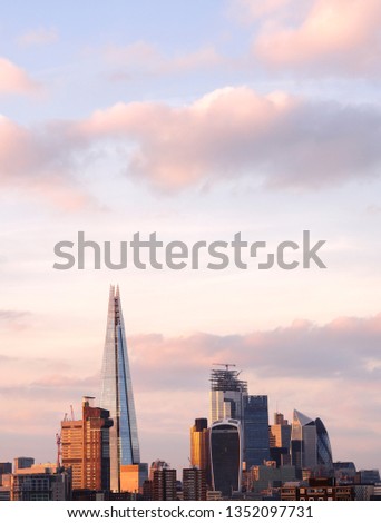 Elevated view of London city skyline at sunset