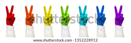 rainbow color rubber protective gloves isolated on white background with clipping path. showing two fingers. seven color, commercical cleaning company, sign everything is cool, rabbit