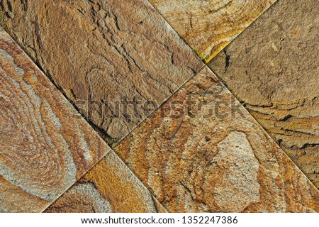 yellow natural stone facade, wall tiles texture / colorful background of natural stone/Sandstone stone texture details 