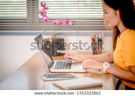 Female businessmen who use laptops and computers in the office