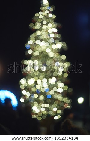 An out-of-focus picture of a Christmas Tree                        