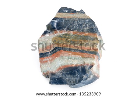 Colorful stone isolated on a white background. Banded iron stone isolated. Banded iron formations or BIFs are sedimentary rock of Precambrian age Royalty-Free Stock Photo #135233909