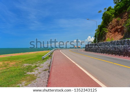 Abstract black asphalt winding Road transport going to the distance with yellow line drawing separated two way of forward and backward, 