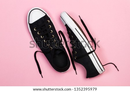 A pair of black sneakers