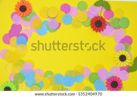 
Yellow background with confetti. Party concept