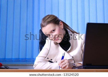 .young businesswoman writing