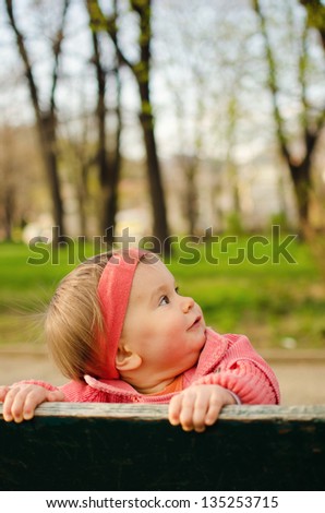 Baby girl in park