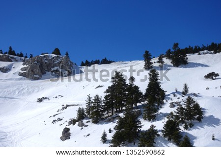 Photo from slopes in mount Parnassos as seen snowed at winter time, Voiotia, Greece
