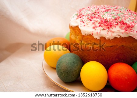 colorful Easter eggs with Easter cake for the holiday.