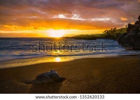 Sunset on beach in Hawaii