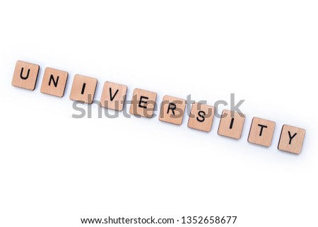 The word UNIVERSITY, spelt with wooden letter tiles on a white background.