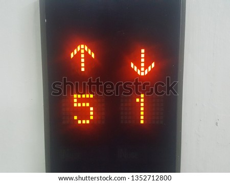 The sign in front of the elevator tells the power to be on the 5th floor down to the 1st floor.