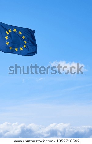                        Flag of Europe against a clear blue sky. Copy space.        