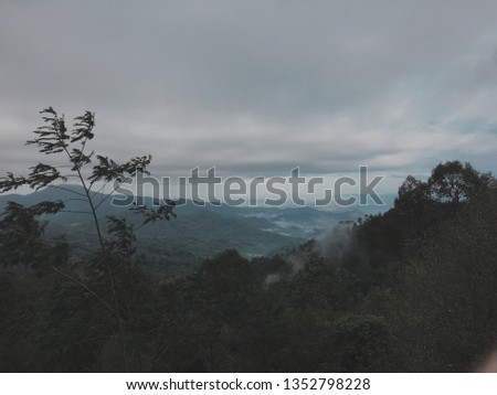 Picture of Menoreh Mountain Range in Kulon Progo, Yogyakarta, Indonesia. Still very natural and green mountain range with a lot of picnic area. This was taken at Kebun Teh Nglinggo.
