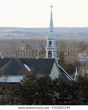 Church steeple in Lowertown and the Gatineau Hills in the distance viewed from Ottawa Ontario Canada.