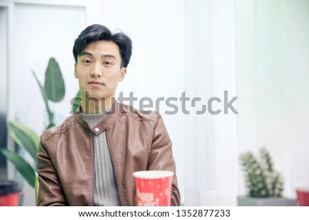 Handsome Asian men in dessert shops