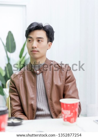 Handsome Asian men in dessert shops