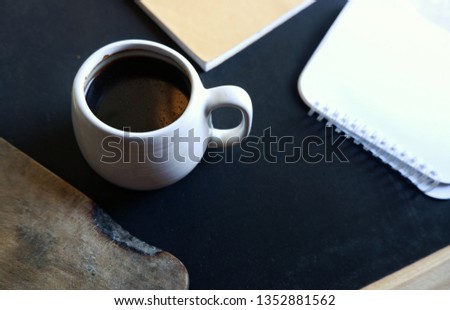 Coffee in a black table background