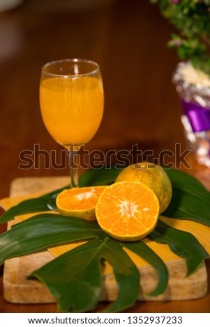 Fresh orange juice Royalty-Free Stock Photo #1352937233