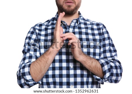Man showing JESUS in sign language on white background, closeup