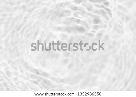 white water wave texture or natural ripple background Royalty-Free Stock Photo #1352986550