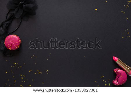 flat lay template, in glamorous chic style, black background, scarlet lipstick and gold sequins. free space in the center