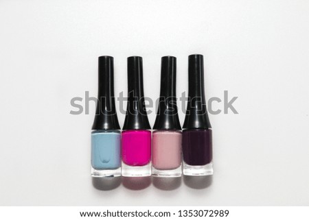 Nail polish of different beautiful juicy flowers on a white background