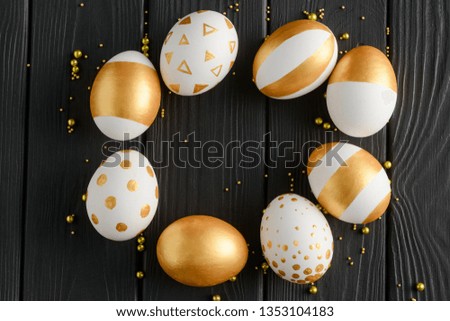 Golden Easter eggs on black