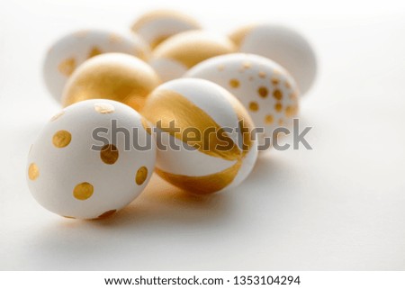 Elegant Easter eggs on white