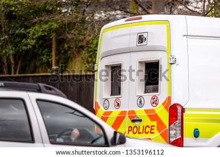 speed camera van on city road checking traffic speed in the UK