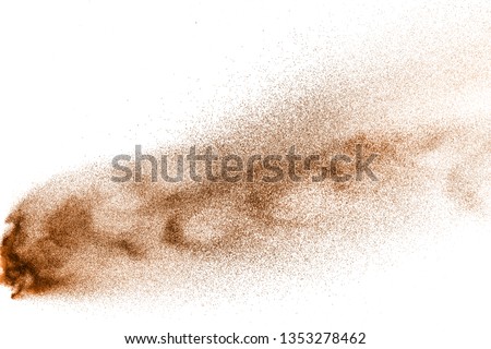 Dry river sand explosion. Brown colored sand splash against  white background.
