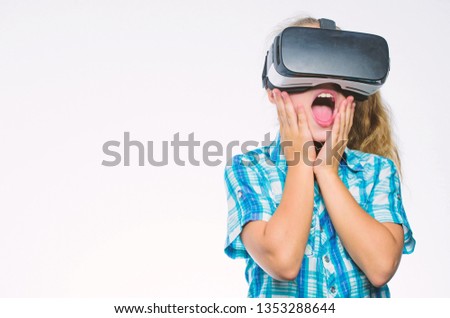 Small kid use modern technology virtual reality. Virtual education for school pupil. Get virtual experience. Virtual reality concept. Girl cute child with head mounted display on white background.