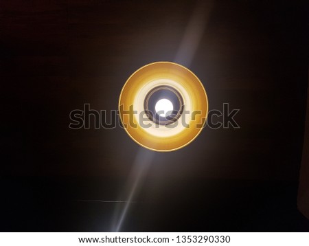 SELANGOR, MALAYSIA - MARCH 29, 2019: The rays of the orange light on the top illuminate the atmosphere. Royalty-Free Stock Photo #1353290330