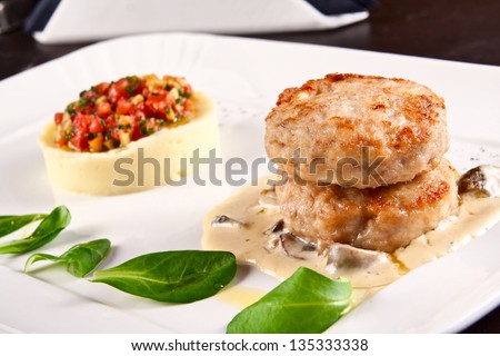 Meatballs with mashed potatoes and mushroom sauce
