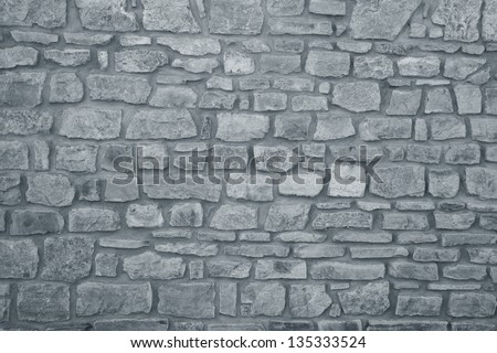 Background of stone wall texture Royalty-Free Stock Photo #135333524