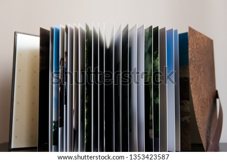 Expanded photo books .photobook sheets.flipping a photo album