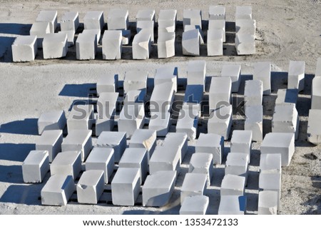 Apuan Alps, Carrara, Tuscany, Italy. March 28, 2019. White Carrara marble blocks in a warehouse.