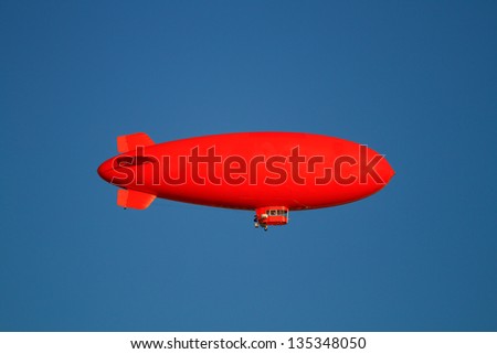 Red Blimp Royalty-Free Stock Photo #135348050