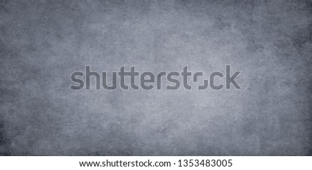 Dark gray wall cement texture.
Old stained concrete wallpaper for design work with copy space. Royalty-Free Stock Photo #1353483005