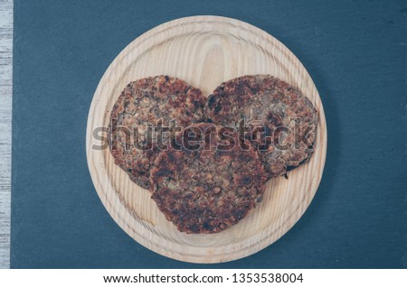 
Vegan burger with lentils. Vegan dish Healthy. Wooden background