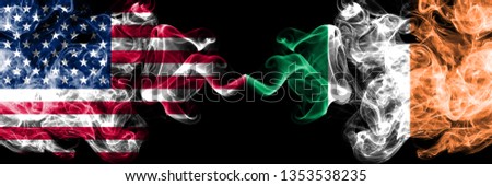 United States of America vs Ireland, Irish smoky mystic flags placed side by side. Thick colored silky smoke flags of America and Ireland, Irish.