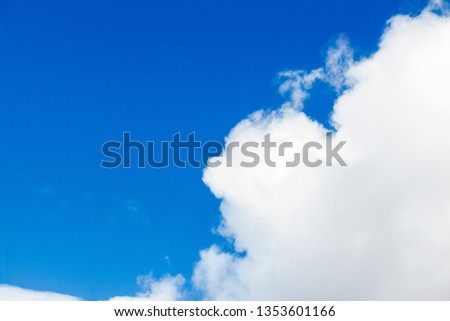 Blue sky background with clouds. White clouds on blue sky.