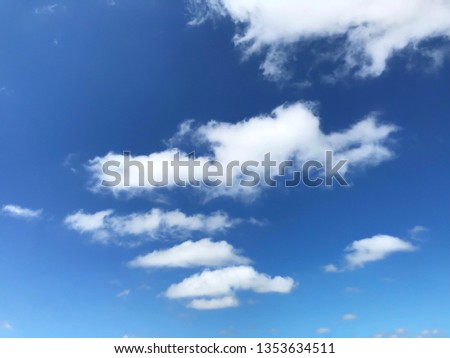 Blue sky and some clouds Natural background in sunny day.