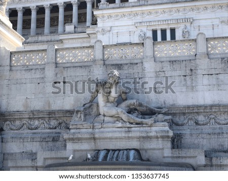 Statue at Capitoline Hill in Rome, Italy with water flowing.