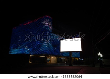 Blank billboard in night city