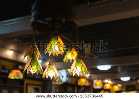Vintage lamp style, in the restaurant background.
